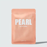 Pearl brightening sheet mask packaging with 'LAPCOS' branding on a light gray background